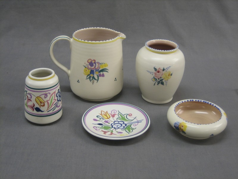 A Poole Pottery jug with floral decoration, base 14th April 2010