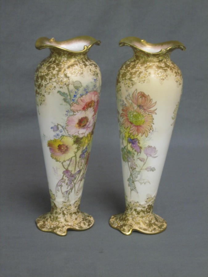 A pair of Doulton Burslem vases with floral decoration 12th May 2010