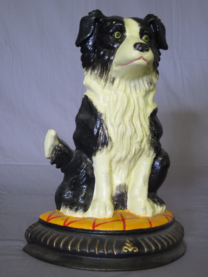 A cast iron door stop in the form of a Collie dog 14" 19th January