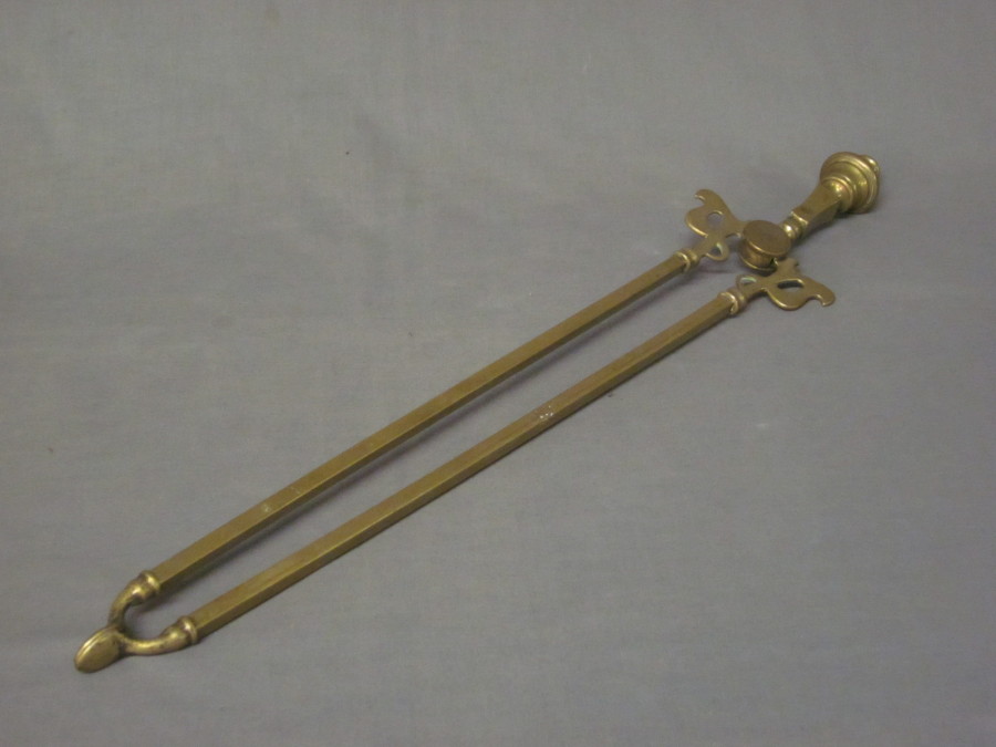 A pair of 19th Century brass fire tongs 16th February 2011 Denhams