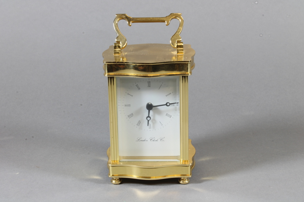 London Clock Company. A mid 20th Century gilt brass 10th July 2013