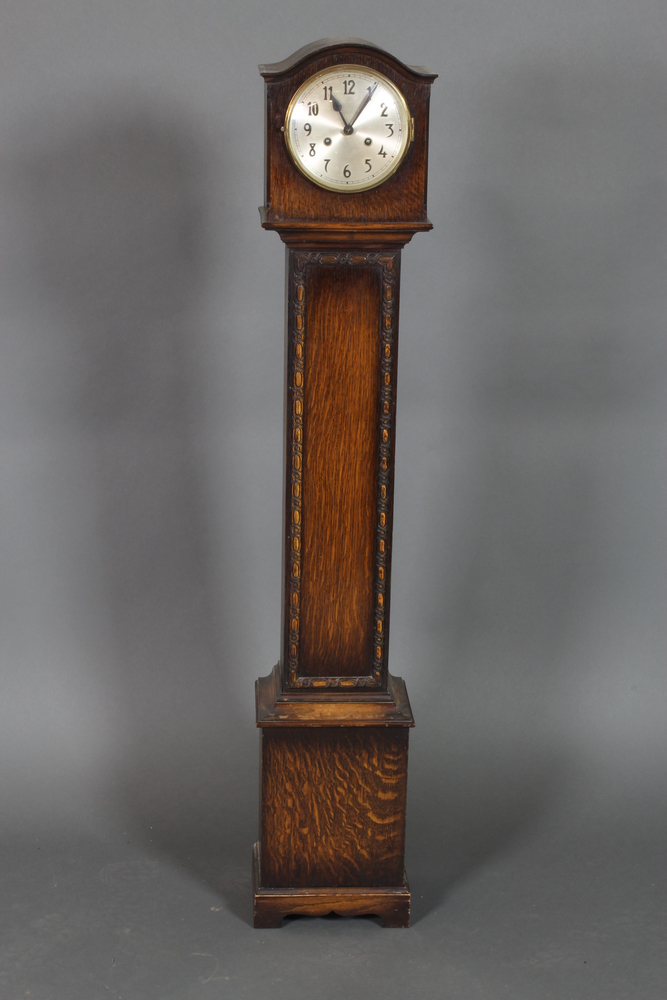 A 1930's 8 day striking "Granddaughter" clock, the 6 23rd April 2014