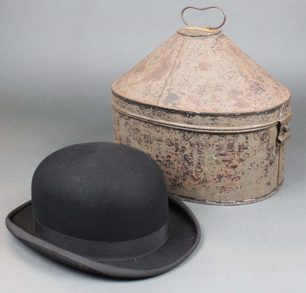 A 19th Century oval pressed metal military hat box, a 21st October