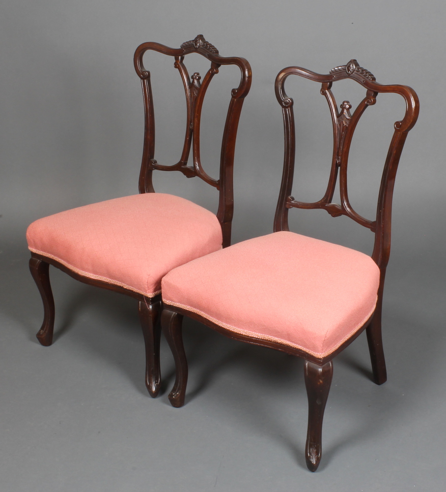 A pair of Victorian mahogany nursing chairs, the over 20th January
