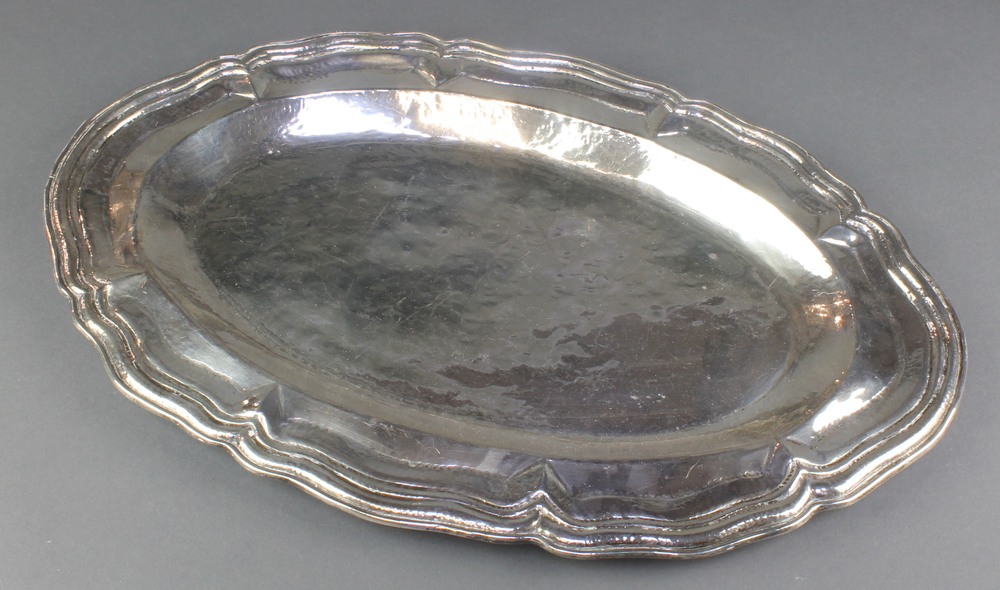 A Middle Eastern silver oval meat platter, 1125 grams 21st December