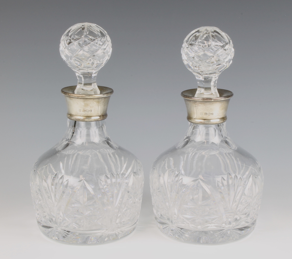 A pair of cut glass mallet shaped decanters and 3rd January 2018 Denhams