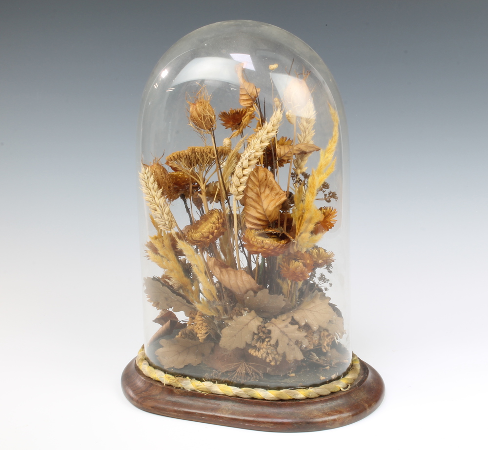 A Victorian arrangement of dried flowers contained 28th March 2018