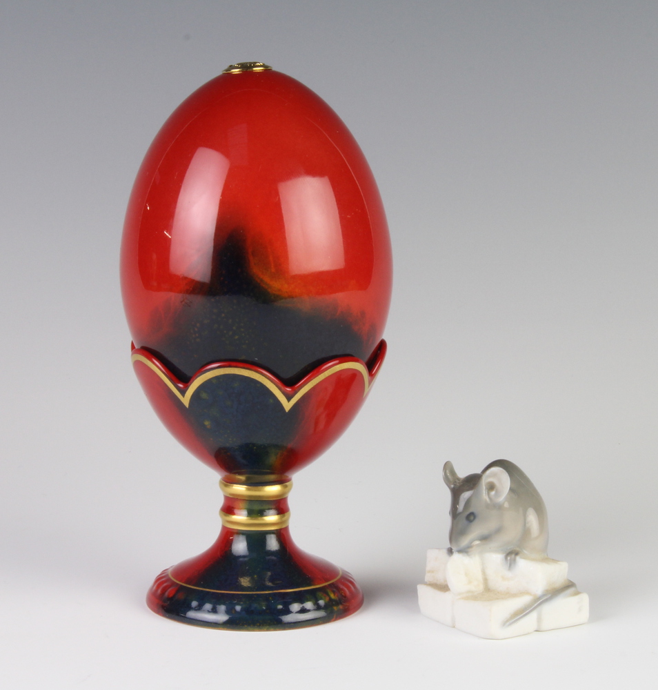 A Royal Doulton flambe egg on stand 13cm together with 20th November