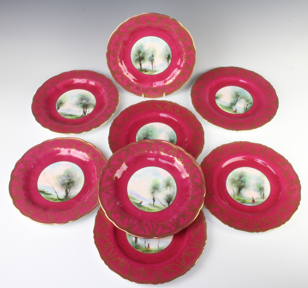Eight Royal Worcester dessert plates, the burgundy and 20th November