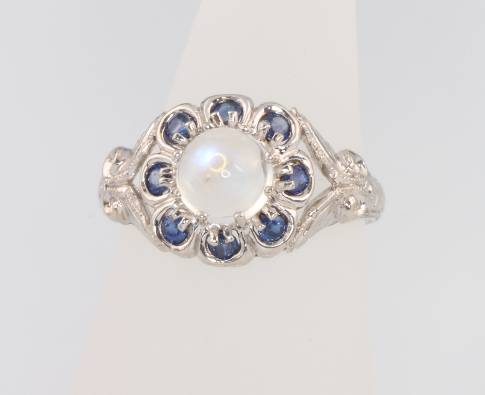 A 9ct white gold moonstone and gem set ring size O 1/2 26th March