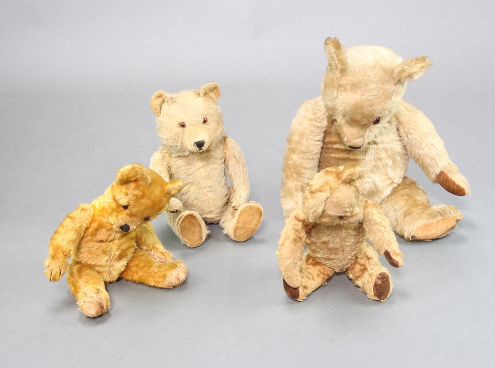 A yellow teddy bear with articulated limbs 64cm, 17th June 2021 Denhams