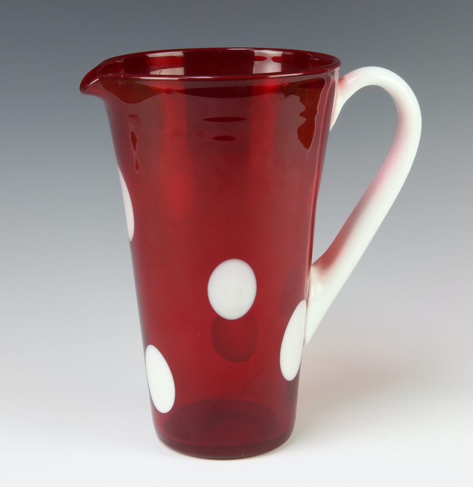 A 1960's red glass jug with white spots and handle 4th November 2021