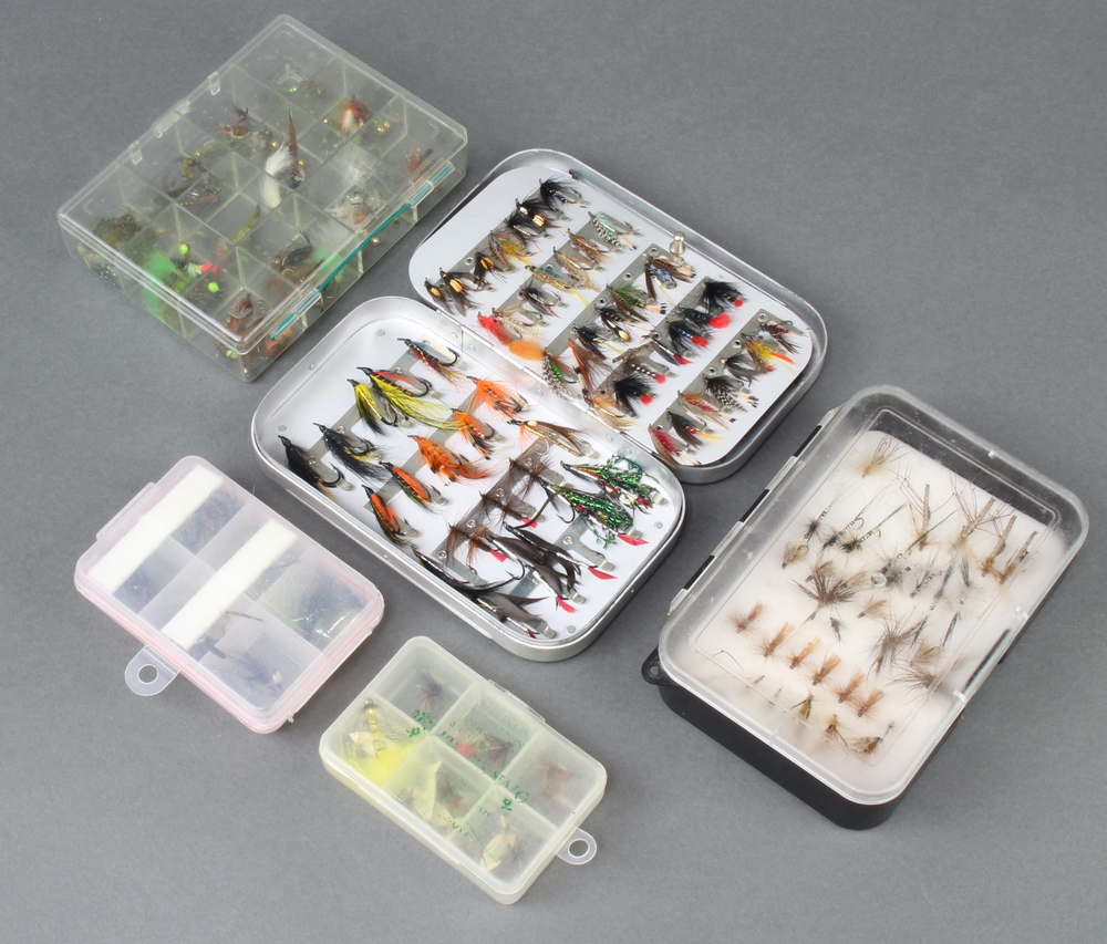 An Orvis dry fly box with fishing flies, a Wheatley 7th April 2022