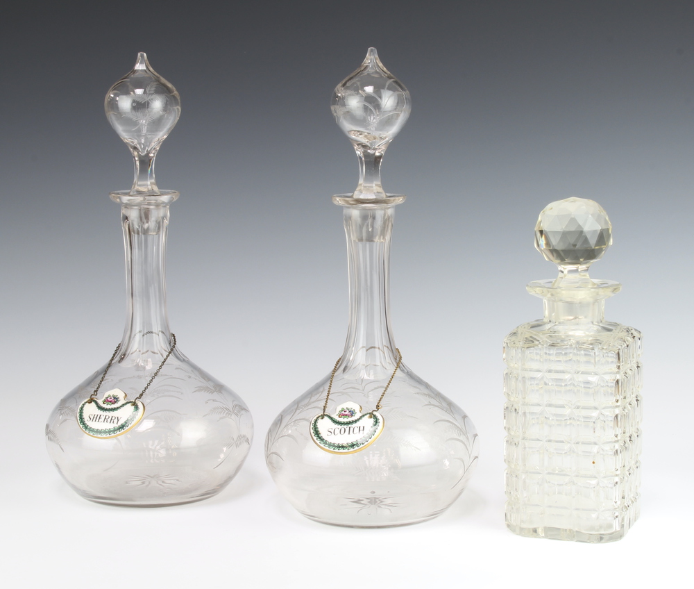 A pair of Edwardian decanters and stoppers with 29th June 2022 Denhams