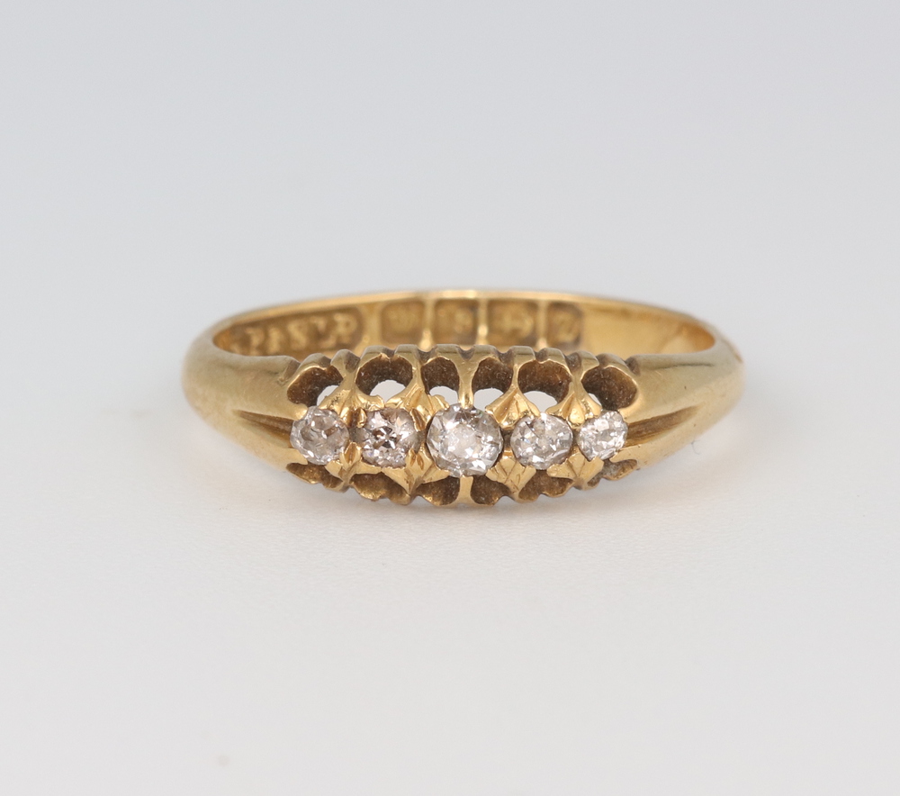 A yellow metal 18ct 5 stone diamond ring size J 1/2, 16th November