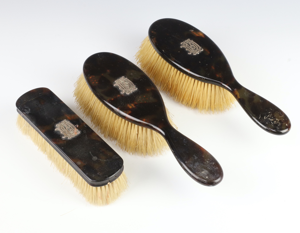 A pair of Edwardian tortoiseshell finished hairbrushes 23rd February
