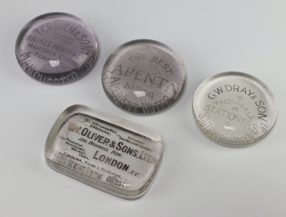 A clear glass advertising paperweight Apenta The 15th June 2023 Denhams