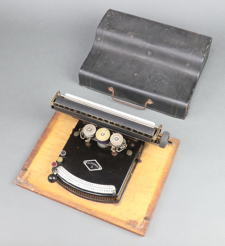 A Gundka no.5 manual typewriter with carrying case 15th June 2023