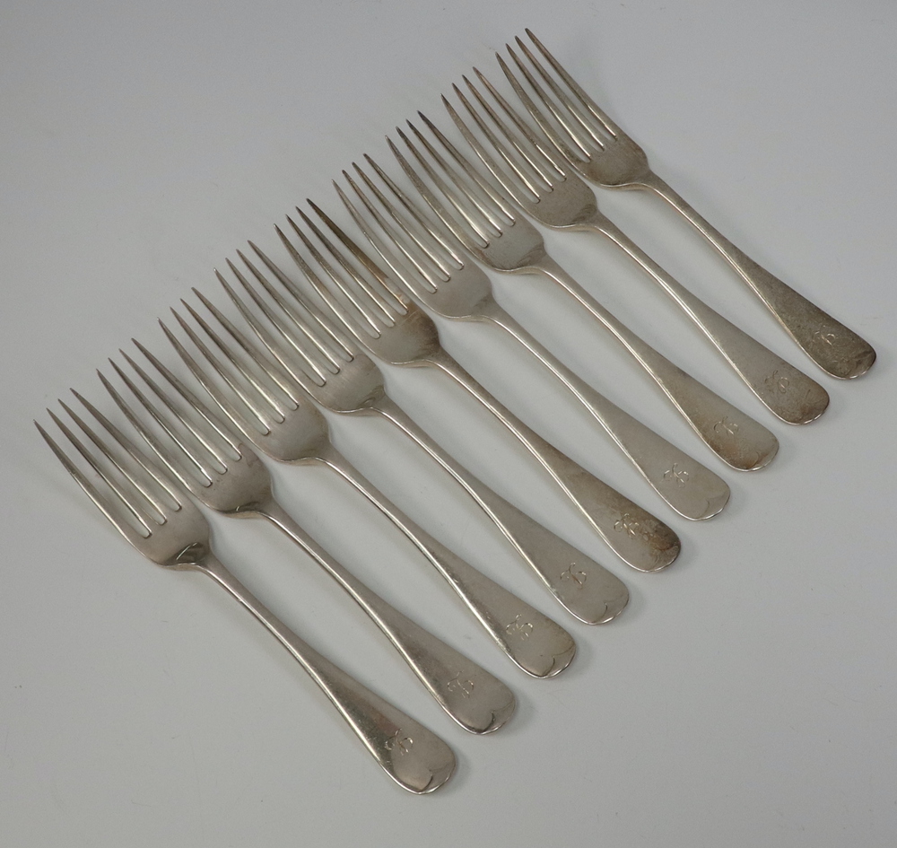 A set of 9 silver dinner forks with engraved monogram, 6th September