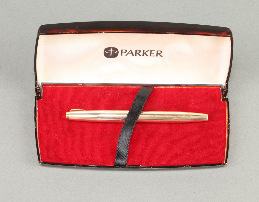 A gentleman's gilt Parker fountain pen with 18ct gold 5th October