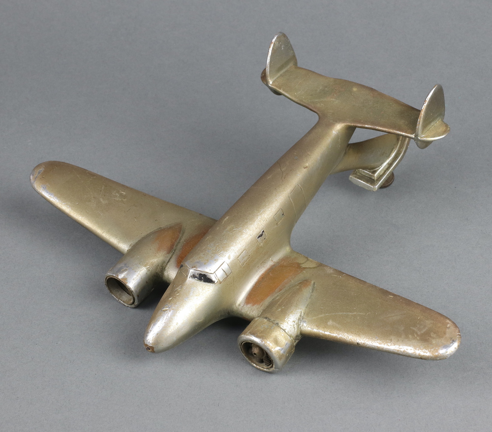 A chrome car mascot in the form of a 2 engined jet 25th January 2024