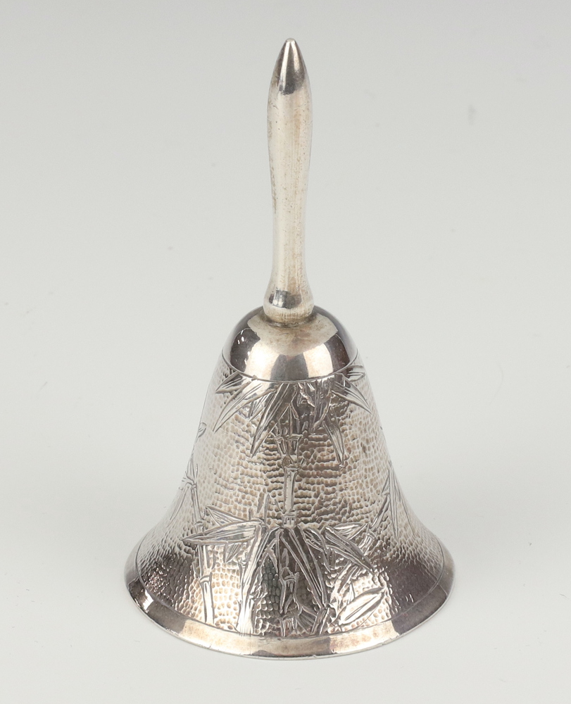 A Sterling silver engraved hand bell 8cm, 38.3 grams 17th April 2024