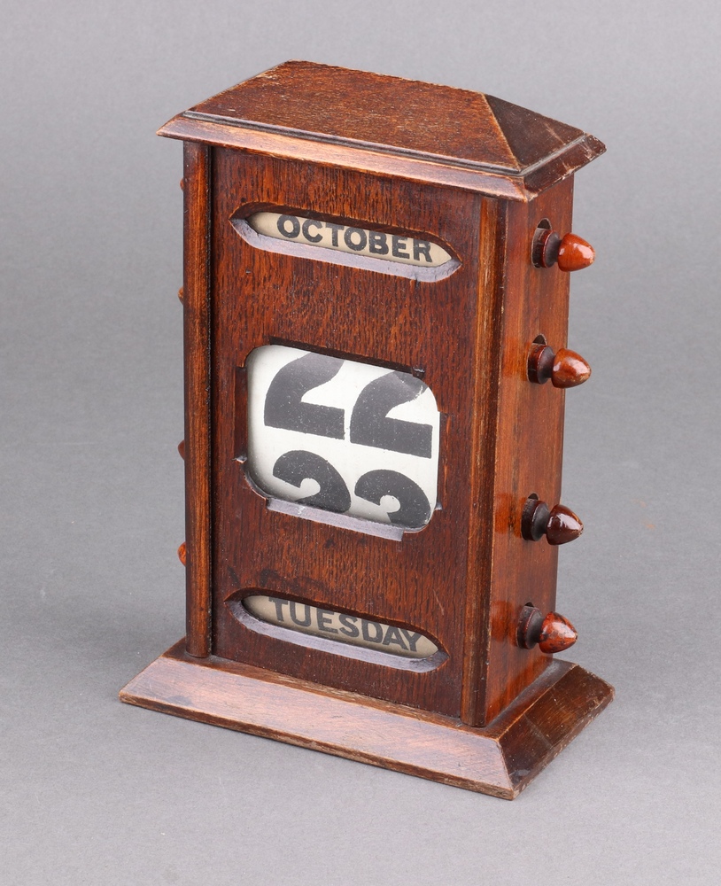 an-edwardian-perpetual-calendar-contained-in-an-oak-24th-september