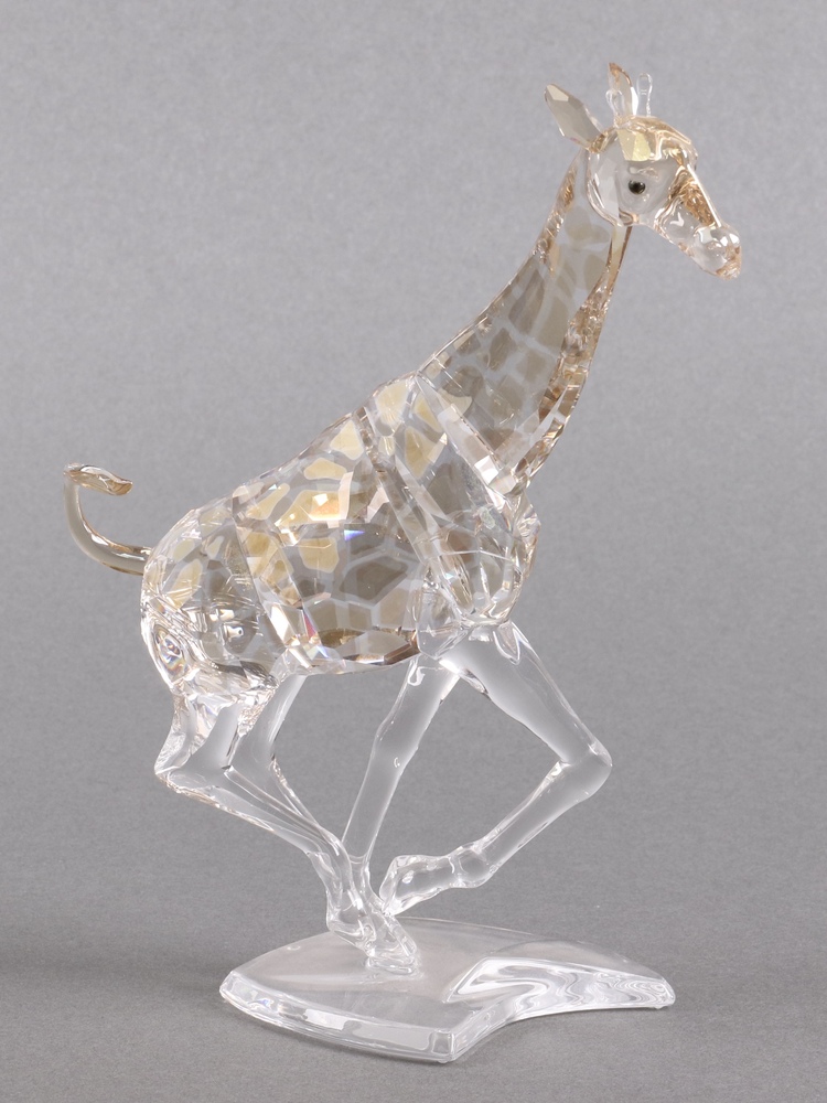 A Swarovski Crystal figure - Giraffe Running 18cm, | 17th June